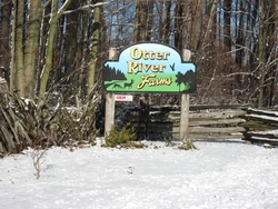 entrance sign for Otter River Farms
